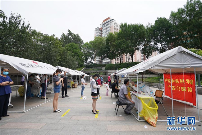 （新華全媒頭條·圖文互動(dòng)）（5）首都再戰(zhàn)“疫”，難忘40天——寫在北京應(yīng)急響應(yīng)級別降級之際 